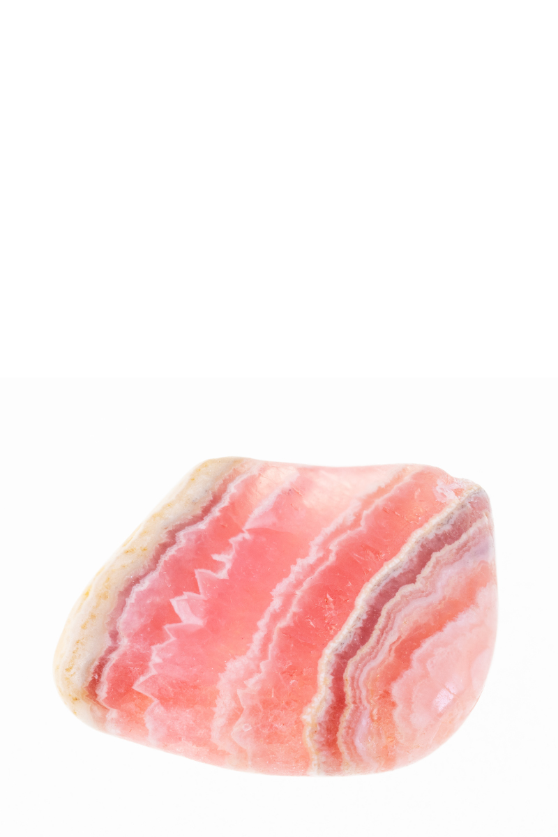 Polished rhodochrosite showing pink bands