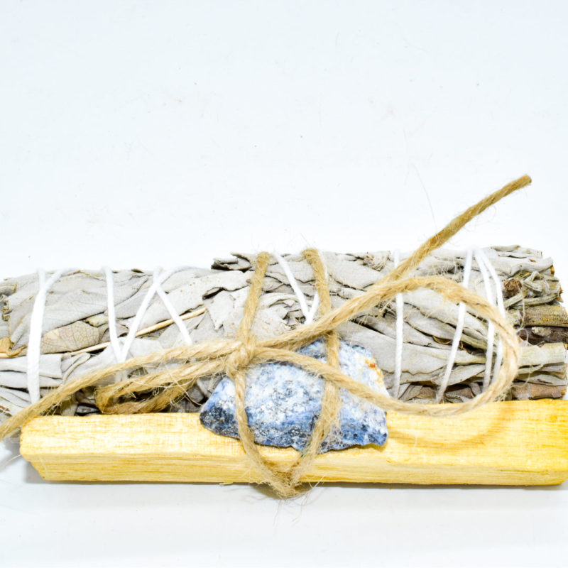 A sage and palo santo crystal cleansing bundle with sodalite